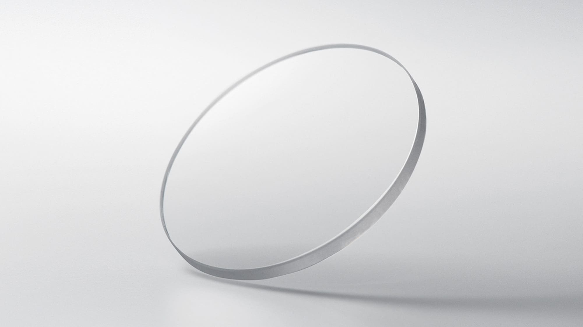 Scratch-resistant, highly transparent sapphire crystal with an anti-reflective coating on the inside surface