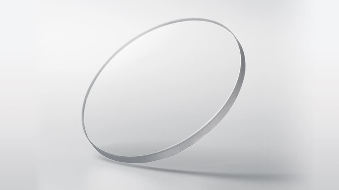 Scratch-resistant, highly transparent sapphire crystal with an anti-reflective coating