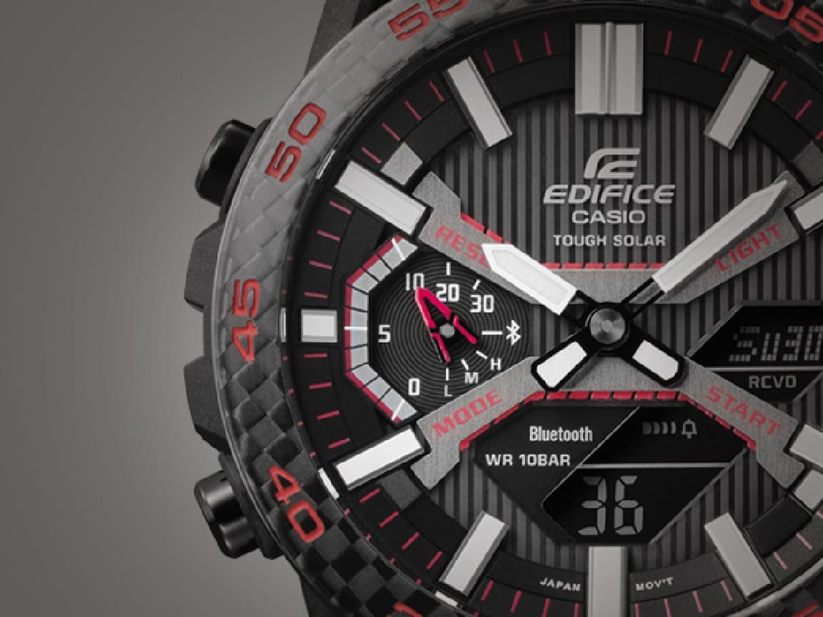 ecb-2000pb-1a analog digital watch close-up with bluetooth and tough solar feature tags